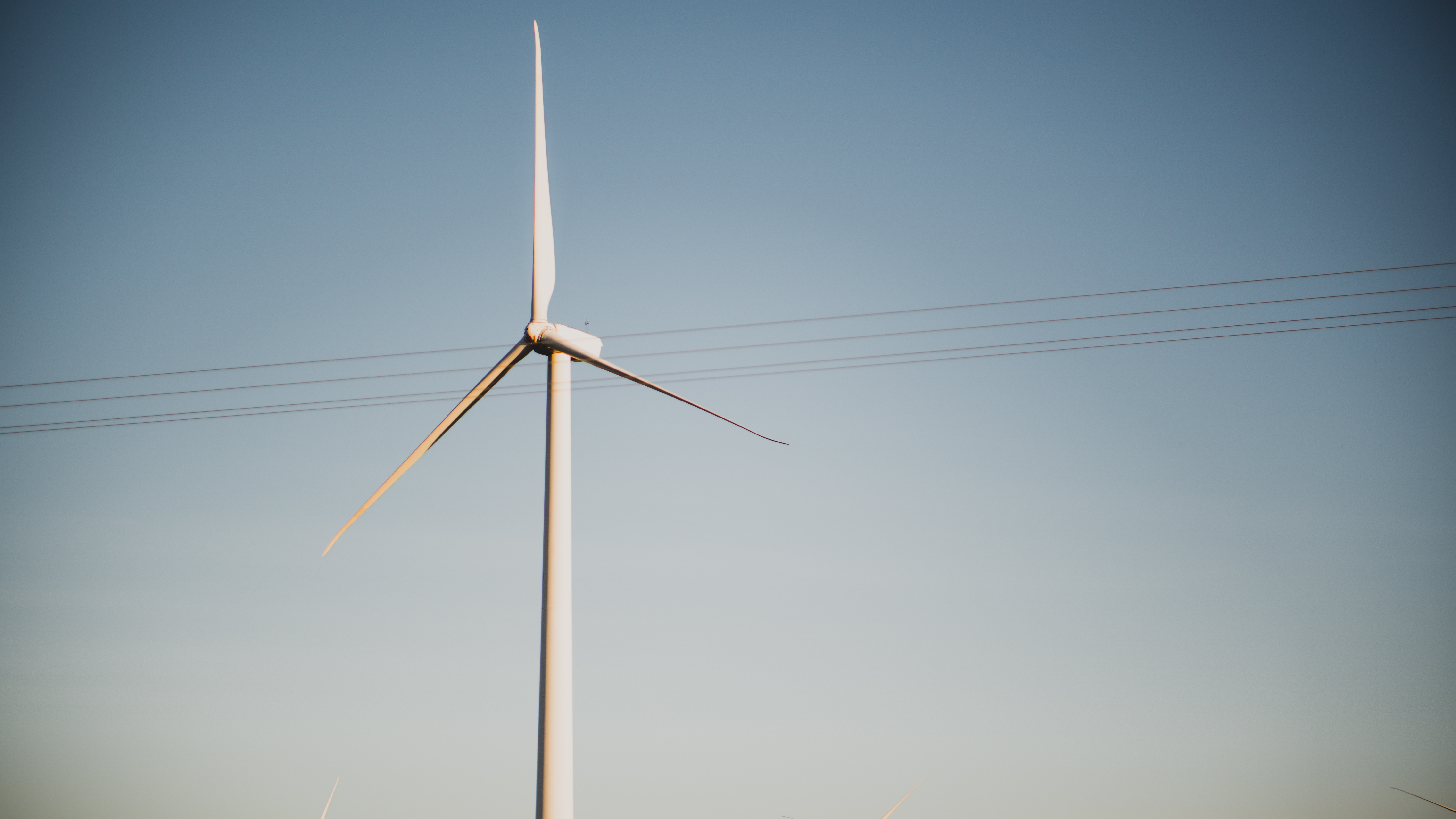 wind turbine, Photo by Andrew Schultz on Unsplash